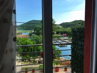 a view of a river from a window at Studio Apartment Cudo Nevidjeno in Karuč