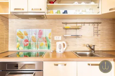 a kitchen with a sink and a counter top at Ancora 2 in Budva