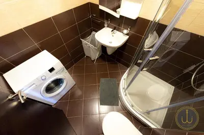 a small bathroom with a toilet and a sink at Ancora 2 in Budva