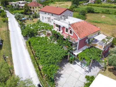 an aerial view of a house with a garden at Apartments Al Parma in Budva