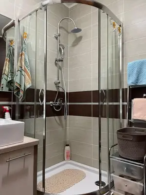 a bathroom with a shower and a sink at Lux Apartment MMS1 in Krimovice