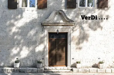 a door on the side of a building at VerDi in Kotor
