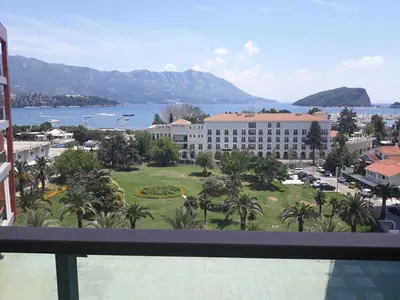 a view from a balcony of a building with a park at Premier LUX apartment in Budva