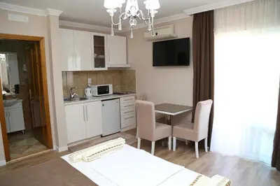 a kitchen with a table and chairs and a dining room at 
