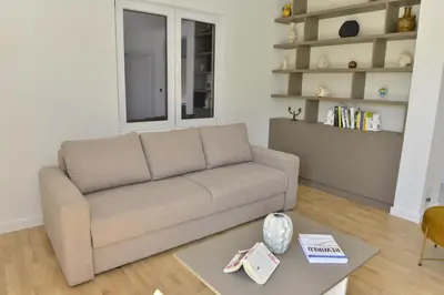 a living room with a couch and a table at Villa Jovanovic in Tivat