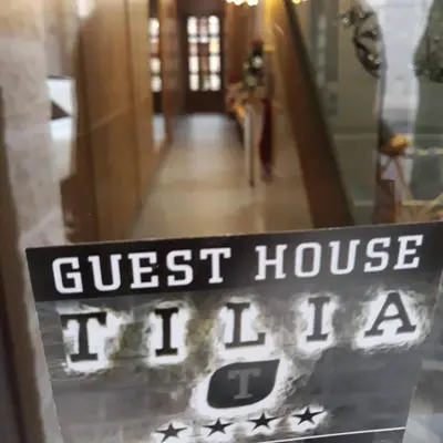 a sign in the window of a guest house at Tilia in Cetinje