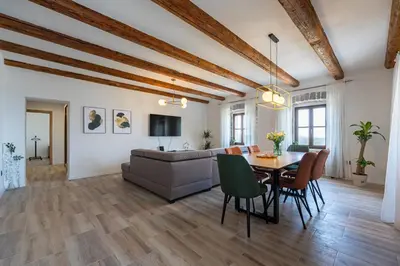 a living room with a table and a couch at Villa Gorazda in Kotor