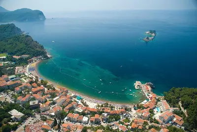 an aerial view of a beach and the ocean at Piazza Apartments 1 in Petrovac na Moru
