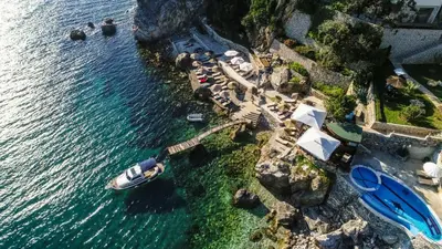 an aerial view of a beach with a boat in the water at Apartments Eneida in Ulcinj