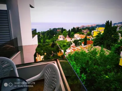 a balcony with a view of a city at IdealHouse Apartments in Ulcinj