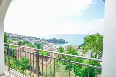 a balcony with a view of the ocean at Apartments Cejovic in Ulcinj
