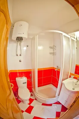 a bathroom with a shower and a toilet and a sink at Apartments Stefan in Becici
