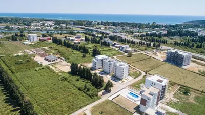 an aerial view of an apartment complex near the ocean at La Dolce Vita Residence in Ulcinj