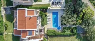 an overhead view of a house with a swimming pool at Villa Zen Port in Petrovac na Moru