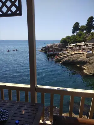 a view of the beach from a balcony at Accommodation Milla in Ulcinj