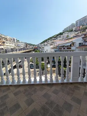 a white railing on top of a balcony at Accommodation Milla in Ulcinj