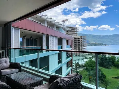 a balcony with a view of the water at Oziris apartment in Budva