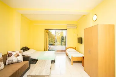 a small room with a bed and a couch at Casa Agata in Ulcinj