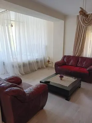 a living room with a couch and a coffee table at Apartments Vidikovac Inn in Kotor