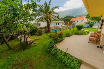 an aerial view of a yard with a patio at Apartmani Novaković in Kotor