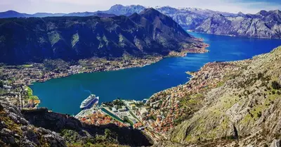 a view of a bay in the mountains at Kotor Bagus - Cozy Boutique Old Town Studio with Seaview Terrace in Kotor