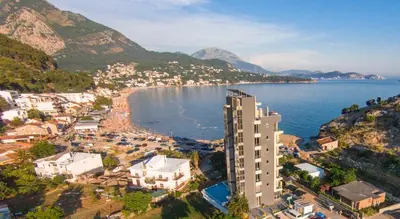 an aerial view of a city and the ocean at Aleksandar in Sutomore