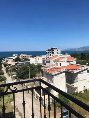 a view of a city from a balcony at Malina apartman in Utjeha
