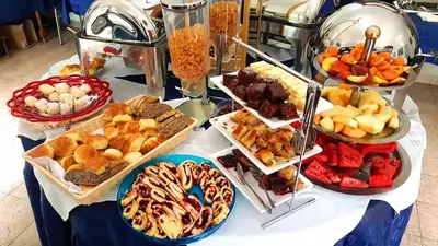 a buffet of different types of food on a table at Villa Bojana in Budva