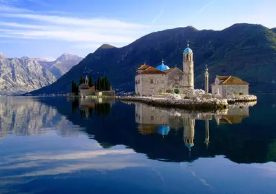 an island in the middle of a body of water at Apartments Villa Milna 2 in Budva
