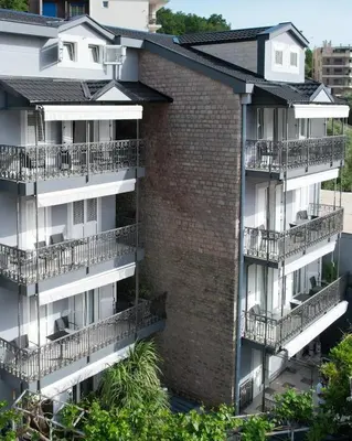 an aerial view of an apartment building with balconies at Apartments Cataleya Przno in Sveti Stefan