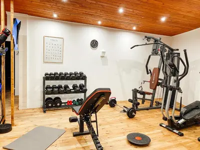 a gym with several exercise equipment in a room at Hotel RESIDENCE in Ulcinj