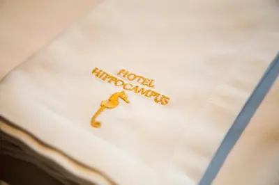 a close up of a white shirt with a houston injuries insignia at Boutique Hotel Hippocampus in Kotor