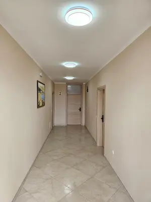 a hallway in a house with a ceiling at Apartments Radosavovic in Bar