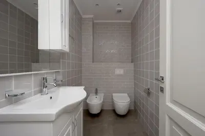 a bathroom with a sink and a toilet at Sunbreeze Delux Vilas in Budva