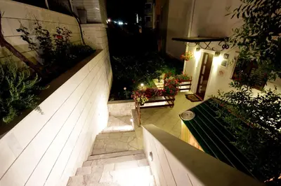 an overhead view of a garden at night at Apartments Ardura in Petrovac na Moru