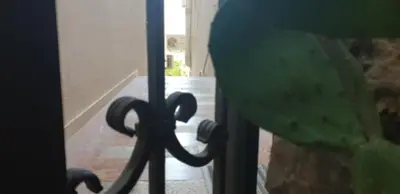 a close up of a glass door with a handle at Apartments Stević - Monaco in Budva