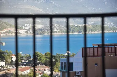 a view of a body of water from a window at Seaview Paradise Apartment in Budva