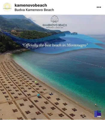 a picture of a beach with chairs and the ocean at Apartmani Dragović in Sveti Stefan