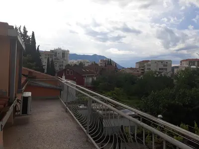 a view of a city from a balcony at Guest House Olga in Budva