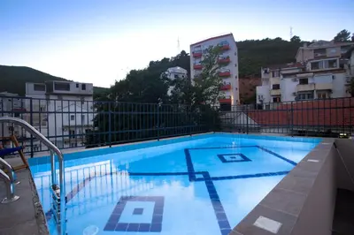a large swimming pool on top of a building at Hotel Twelve by Aycon in Budva