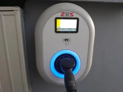 a white and blue machine with a phone in it at Hotel M in Podgorica