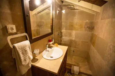 a bathroom with a sink and a shower at Villa Irma in Bar