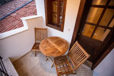 an overhead view of a table and two chairs next to a door at Villa Irma in Bar
