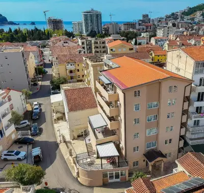 an aerial view of a city with buildings at Azzuro apartments Budva in Budva