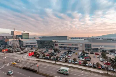 an overhead view of a parking lot in a city at Eureka Apartment in Podgorica