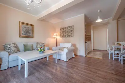 a living room with a couch and a table at Marinero Apartments in Budva