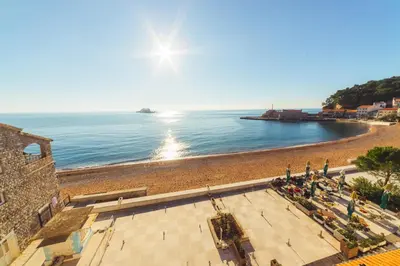 a view of the beach from a building at Apartments LIDO Petrovac in Petrovac na Moru