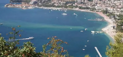 a view of a beach with boats in the water at Apartment Golden Lavender in Budva