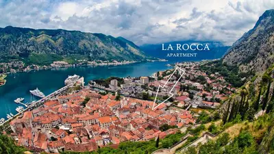 an aerial view of the town of la rocca on a lake at La Rocca Apartment Old Town Kotor in Kotor