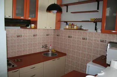 a kitchen with a sink and a counter top at Beachfront apartment in Becici,Rafilovici,Budva in Budva